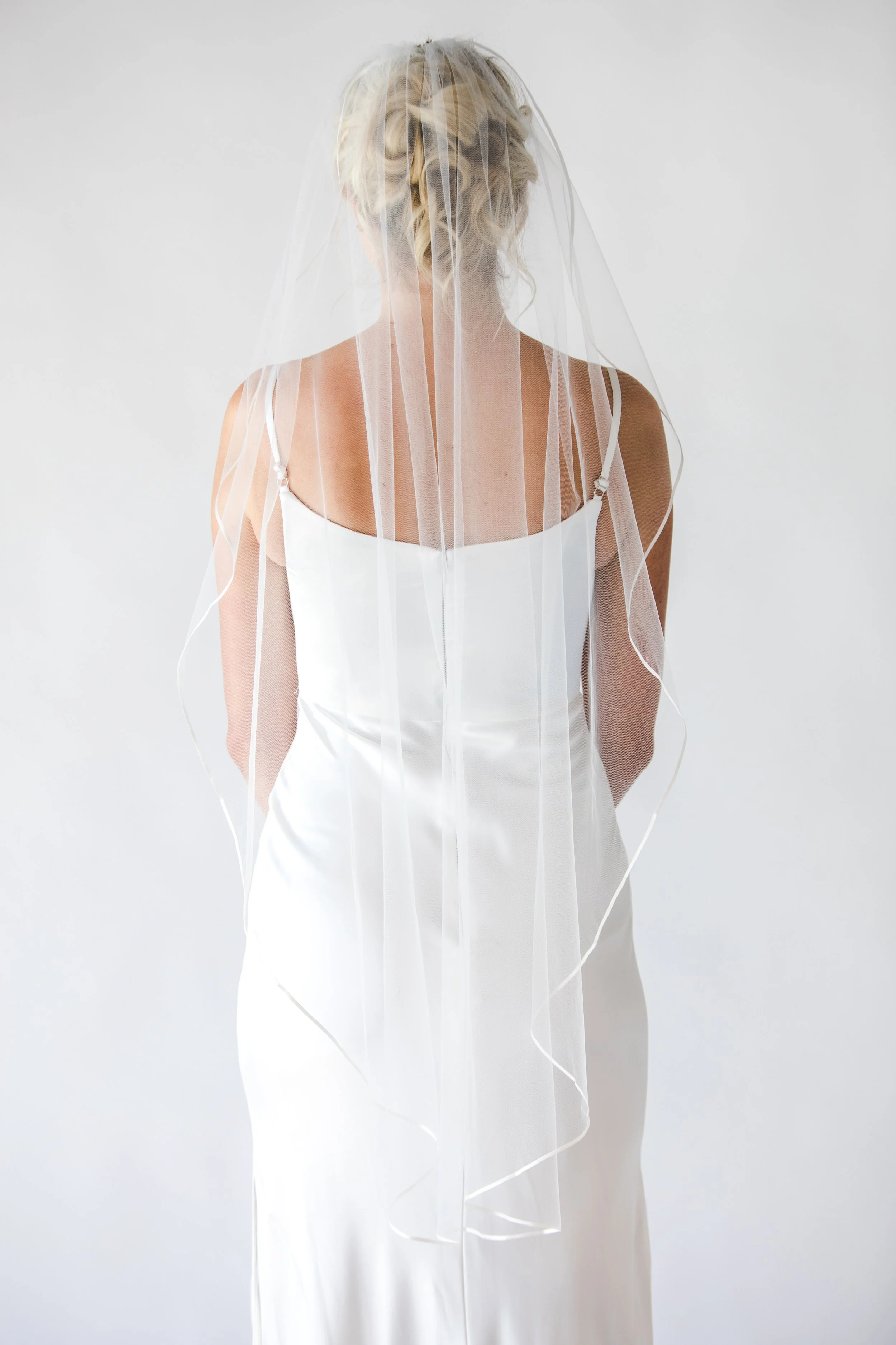 Blaise wavy bridal fingertip length veil. — Justine M Couture